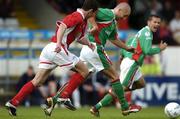 8 June 2004; John O'Flynn, Cork City, in action against Ollie Cahill, Shelbourne. eircom League, Premier Division, Shelbourne v Cork City, Tolka Park, Dublin. Picture credit; David Maher / SPORTSFILE