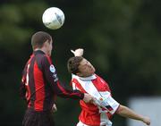 8 June 2004; Jimmi Lee Jones, St. Patrick's Athletic, in action against Barry Ferguson, Longford Town. eircom League, Premier Division, Richmond Park, Dublin. Picture credit; Brian Lawless / SPORTSFILE