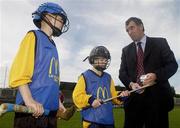 9 June 2004; Dublin hurling manager Humphrey Kelleher  instructs, 11 year old, Sean O'Donovan and, 12 year old, Conor O'Broian, left, at the Dublin final of the McDonalds Lift & Strike Competition. Parnell Park, Dublin. Picture credit; Pat Murphy / SPORTSFILE