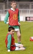 9 June 2004; Zak McDermott, 12 years, standing, and Tomas Kelly, 13 years, Airfield Boys School, Dublin, await their turn in the Dublin final of the McDonalds Lift & Strike Competition. Parnell Park, Dublin. Picture credit; Pat Murphy / SPORTSFILE