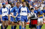 6 June 2004; The Waterford team, led by captain Ken McGrath, during the pre-match parade. Guinness Munster Senior Hurling Championship Semi-Final, Tipperary v Waterford, Pairc Ui Chaoimh, Cork. Picture credit; Pat Murphy / SPORTSFILE