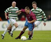 4 June 2004; Declan O'Brien, Drogheda United, in action against Jason McGuinness and Derek Tracey, left, Shamrock Rovers. eircom league, Premier Division, Shamrock Rovers v Drogheda United, Richmond Park, Dublin. Picture credit; Brian Lawless / SPORTSFILE