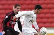 11 June 2004; Wesley Hoolahan, Shelbourne, in action against Barry Ferguson, Longford Town. eircom league, Premier Division, Longford Town v Shelbourne, Flancare Park, Longford. Picture credit; David Maher / SPORTSFILE