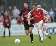 8 June 2004; Aidan O'Keeffe, St. Patrick's Athletic, in action against Dean Fitzgerald, Longford Town. eircom League, Premier Division, St. Patrick's Athletic v Longford, Richmond Park, Dublin. Picture credit; Brian Lawless / SPORTSFILE