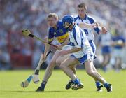 6 June 2004; Conor Gleeson, Tipperary, in action against Brian Phelan and Michael Walsh, Waterford. Guinness Munster Senior Hurling Championship semi-final, Tipperary v Waterford, Pairc Ui Chaoimh, Cork. Picture credit; Brendan Moran / SPORTSFILE
