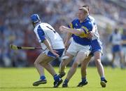 6 June 2004; Conor Gleeson, Tipperary, in action against Brian Phelan and Michael Walsh, left, Waterford. Guinness Munster Senior Hurling Championship semi-final, Tipperary v Waterford, Pairc Ui Chaoimh, Cork. Picture credit; Brendan Moran / SPORTSFILE