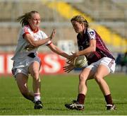 17 August 2013; Annette Clarke, Galway, in action against Neamh Woods, Tyrone. TG4 All-Ireland Ladies Football Senior Championship, Quarter-Final, Galway v Tyrone, Kingspan Breffni Park, Cavan. Picture credit: Oliver McVeigh / SPORTSFILE