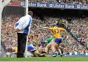 18 August 2013; The sliothar ends up in the Limerick net as Clare's Darach Honan closes in with Limerick's Tom Condon and goalkeeper Nickie Quaid. GAA Hurling All-Ireland Senior Championship, Semi-Final, Limerick v Clare, Croke Park, Dublin. Picture credit: Brendan Moran / SPORTSFILE