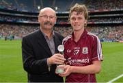 18 August 2013; Galway's Brian Molloy is presented with the Electric Ireland Man of the Match award by Mike Counihan, Sales Manager, Business Markets, Electric Ireland. Electric Ireland GAA Hurling All-Ireland Minor Championship Semi-Final, Limerick v Galway, Croke Park, Dublin. Photo by Sportsfile