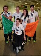 20 August 2013; The Irish squad, sponsored by Allianz, return from the 2013 Paralympic World Swimming Championships in Canada. The team secured an impressive eight medals ensuring that it was Ireland's best ever performance at the Paralympic World Swimming Championships. Pictured are members of Irish squad including Gold medallist Darragh McDonald, left, from Gorey, Co. Wexford, Jonathan McGrath, from Killaloe, Co. Clare, Ellen Keane, from Clontarf, Dublin, who won two Bronze medals, Laurence McGivern, right, from Rostrevor, Co. Down, and James Scully, from Ratoath, Co. Meath, who won a Bronze medal apiece. Dublin Airport, Dublin. Picture credit: Ray McManus / SPORTSFILE