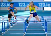 5 February 2023; Tina Gallagher of OMG AC, Fermanagh, right, and Mary Barrett of Loughrea AC, Galway, competing in the Women's F60 60m Hurdles during the 123.ie National Masters Indoor Championships at the TUS International arena in Athlone, Westmeath. Photo by Ben McShane/Sportsfile