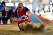 5 February 2023; John O'connor of Enniscorthy AC, Wexford, competing in the Men's M55 Long Jump during the 123.ie National Masters Indoor Championships at the TUS International arena in Athlone, Westmeath. Photo by Ben McShane/Sportsfile