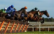 5 February 2023; Runners and riders, from left, Still Ciel, with Sean Flanaghan up, Banntown Girl, with Danny Mullins, and Sainte Dona, with Bryan Cooper up, jump the second during the Irish Stallion Farms EBF Paddy Mullins Mares Handicap Hurdle on day two of the Dublin Racing Festival at Leopardstown Racecourse in Dublin. Photo by Seb Daly/Sportsfile