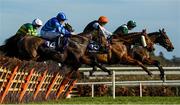 5 February 2023; Runners and riders, from left, Still Ciel, with Sean Flanaghan up, Banntown Girl, with Danny Mullins, and Sainte Dona, with Bryan Cooper up, jump the second during the Irish Stallion Farms EBF Paddy Mullins Mares Handicap Hurdle on day two of the Dublin Racing Festival at Leopardstown Racecourse in Dublin. Photo by Seb Daly/Sportsfile