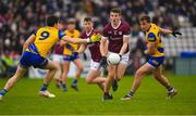 5 February 2023; John Daly of Galway in action against Keith Doyle and Enda Smith of Roscommon during the Allianz Football League Division 1 match between Galway and Roscommon at Pearse Stadium in Galway. Photo by Ray Ryan/Sportsfile