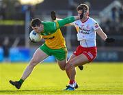 5 February 2023; Jamie Brennan of Donegal in action against Michael McKernan of Tyrone during the Allianz Football League Division 1 match between Tyrone and Donegal at O'Neill's Healy Park in Omagh, Tyrone. Photo by Ramsey Cardy/Sportsfile