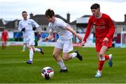5 February 2023; Darragh O'Shea of Cork Youth League in action against Conor Daly of Galway District League during the FAI Youth Inter-League Cup Final 2023 match between Galway District League and Cork Youth League at Eamonn Deacy Park in Galway. Photo by Tyler Miller/Sportsfile