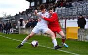5 February 2023; Darragh O'Shea of Cork Youth League in action against Conor Daly of Galway District League during the FAI Youth Inter-League Cup Final 2023 match between Galway District League and Cork Youth League at Eamonn Deacy Park in Galway. Photo by Tyler Miller/Sportsfile
