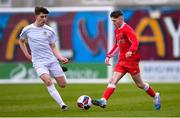 5 February 2023; Darragh O'Shea of Cork Youth League in action against Scott Dillon of Galway District League during the FAI Youth Inter-League Cup Final 2023 match between Galway District League and Cork Youth League at Eamonn Deacy Park in Galway. Photo by Tyler Miller/Sportsfile