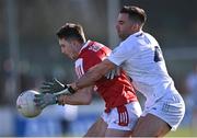 5 February 2023; Chris Óg Jones of Cork in action against Ryan Houlihan of Kildare during the Allianz Football League Division 2 match between Kildare and Cork at St Conleth's Park in Newbridge, Kildare. Photo by Piaras Ó Mídheach/Sportsfile
