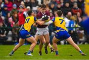 5 February 2023; Mathew Tierney of Galway in action against Diarmuid Murtagh and Niall Daly of Roscommon during the Allianz Football League Division 1 match between Galway and Roscommon at Pearse Stadium in Galway. Photo by Ray Ryan/Sportsfile