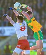 5 February 2023; Martin O'Reilly of Donegal in action against Conn Kilpatrick of Tyrone during the Allianz Football League Division 1 match between Tyrone and Donegal at O'Neill's Healy Park in Omagh, Tyrone. Photo by Ramsey Cardy/Sportsfile
