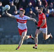 5 February 2023; Lachlan Murray of Derry in action against Dermot Campbell of Louth during the Allianz Football League Division 2 match between Louth and Derry at DEFY Pairc Mhuire in Ardee, Louth. Photo by Stephen Marken/Sportsfile