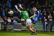 5 February 2023; Con O'Callaghan of Dublin scores a point despite the efforts of David Connolly of Limerick during the Allianz Football League Division 2 match between Limerick and Dublin at TUS Gaelic Grounds in Limerick. Photo by Sam Barnes/Sportsfile