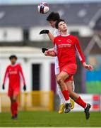 5 February 2023; Charlie Quinn of Galway District League and Luke O'Donnell of Cork Youth League battle for possession during the FAI Youth Inter-League Cup Final 2023 match between Galway District League and Cork Youth League at Eamonn Deacy Park in Galway. Photo by Tyler Miller/Sportsfile