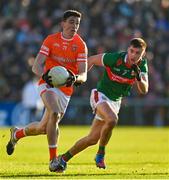 5 February 2023; Rory Grugan of Armagh in action against Enda Hession of Mayo during the Allianz Football League Division 1 match between Armagh and Mayo at Box-It Athletic Grounds in Armagh. Photo by Brendan Moran/Sportsfile