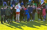 5 February 2023; Cathal McShane of Tyrone with supporters after the Allianz Football League Division 1 match between Tyrone and Donegal at O'Neill's Healy Park in Omagh, Tyrone. Photo by Ramsey Cardy/Sportsfile
