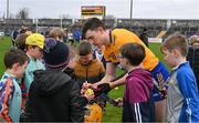 5 February 2023; David Fitzgerald of Clare signs autographs after the Allianz Hurling League Division 1 Group A match between Clare and Westmeath at Cusack Park in Ennis, Clare. Photo by Ray McManus/Sportsfile
