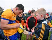 5 February 2023; Mark Rodgers of Clare autographs a hat for a supporter after the Allianz Hurling League Division 1 Group A match between Clare and Westmeath at Cusack Park in Ennis, Clare. Photo by Ray McManus/Sportsfile
