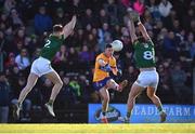 5 February 2023; Cian O’Dea of Clare in action against Adam O’Neill, left, and Ronan Jones of Meath during the Allianz Football League Division 2 match between Meath and Clare at Páirc Tailteann in Navan, Meath. Photo by Daire Brennan/Sportsfile
