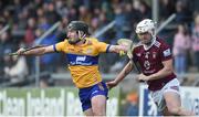 5 February 2023; Ian Galvin of Clare is tackled by Jack Galvin of Westmeath during the Allianz Hurling League Division 1 Group A match between Clare and Westmeath at Cusack Park in Ennis, Clare. Photo by John Sheridan/Sportsfile