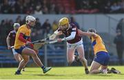 5 February 2023; Owen McCabe of Westmeath is tackled by Adam Hogan, left, and Cathal Malone of Clare during the Allianz Hurling League Division 1 Group A match between Clare and Westmeath at Cusack Park in Ennis, Clare. Photo by John Sheridan/Sportsfile