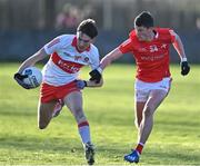 5 February 2023; Paul Cassidy of Derry in action against Jay Hughes of Louth during the Allianz Football League Division 2 match between Louth and Derry at DEFY Pairc Mhuire in Ardee, Louth. Photo by Stephen Marken/Sportsfile