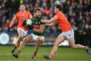 5 February 2023; Aidan O'Shea of Mayo is tackled by Aaron McKay of Armagh during the Allianz Football League Division 1 match between Armagh and Mayo at Box-It Athletic Grounds in Armagh. Photo by Brendan Moran/Sportsfile