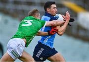 5 February 2023; Colm Basquel of Dublin in action against Séan O'Dea of Limerick during the Allianz Football League Division 2 match between Limerick and Dublin at TUS Gaelic Grounds in Limerick. Photo by Sam Barnes/Sportsfile