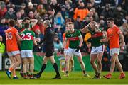 5 February 2023; Mayo players, from left, Conor McStay, 23, Matthew Ruane, David McBrien and Jordan Flynn react as referee Fergal Kelly awards an injury time free kick to Armagh, which Rian O'Neill of Armagh subsequently kicked to level the Allianz Football League Division 1 match between Armagh and Mayo at Box-It Athletic Grounds in Armagh. Photo by Brendan Moran/Sportsfile