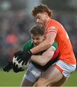 5 February 2023; Darren McHale of Mayo is tackled by Jason Duffy of Armagh during the Allianz Football League Division 1 match between Armagh and Mayo at Box-It Athletic Grounds in Armagh. Photo by Brendan Moran/Sportsfile