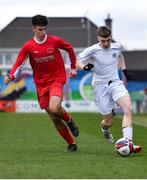 5 February 2023; Ben Costelloe of Galway District League in action against Scott Dillon of Galway District League during the FAI Youth Inter-League Cup Final 2023 match between Galway District League and Cork Youth League at Eamonn Deacy Park in Galway. Photo by Tyler Miller/Sportsfile
