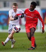 5 February 2023; Paul Omshule of Cork Youth League in action against Ben Costelloe of Galway District League during the FAI Youth Inter-League Cup Final 2023 match between Galway District League and Cork Youth League at Eamonn Deacy Park in Galway. Photo by Tyler Miller/Sportsfile