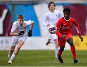 5 February 2023; Paul Omshule of Cork Youth League in action against Ben Costelloe of Galway District League during the FAI Youth Inter-League Cup Final 2023 match between Galway District League and Cork Youth League at Eamonn Deacy Park in Galway. Photo by Tyler Miller/Sportsfile