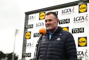 6 February 2023; Dublin manager Mick Bohan speaking to TG4 before the 2023 Lidl Ladies National Football League Division 1 Round 3 match between Cork and Dublin at Pairc Ui Rinn in Cork. Photo by Eóin Noonan/Sportsfile