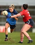 6 February 2023; Caoimhe O'Connor of Dublin is tackled by Shauna Kelly of Cork during the 2023 Lidl Ladies National Football League Division 1 Round 3 match between Cork and Dublin at Pairc Ui Rinn in Cork. Photo by Eóin Noonan/Sportsfile