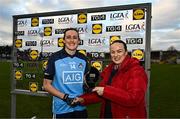 6 February 2023; Hannah Tyrrell of Dublin is presented with the Player of the Match award by Marta Gaffke, Store Manager, Lidl Ballyvolane, following the 2023 Lidl Ladies National Football League Division 1 Round 3 match between Cork and Dublin at Páirc Uí Rinn in Cork. Photo by Eóin Noonan/Sportsfile