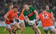 5 February 2023; James Carr of Mayo in action against Jason Duffy and Tiernan Kelly of Armagh during the Allianz Football League Division 1 match between Armagh and Mayo at Box-It Athletic Grounds in Armagh. Photo by Brendan Moran/Sportsfile