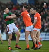 5 February 2023; Cillian O'Connor of Mayo, left, tussles with Connaire Mackin of Armagh during the Allianz Football League Division 1 match between Armagh and Mayo at Box-It Athletic Grounds in Armagh. Photo by Brendan Moran/Sportsfile