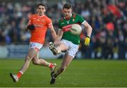 5 February 2023; Matthew Ruane of Mayo in action against Rory Grugan of Armagh during the Allianz Football League Division 1 match between Armagh and Mayo at Box-It Athletic Grounds in Armagh. Photo by Brendan Moran/Sportsfile